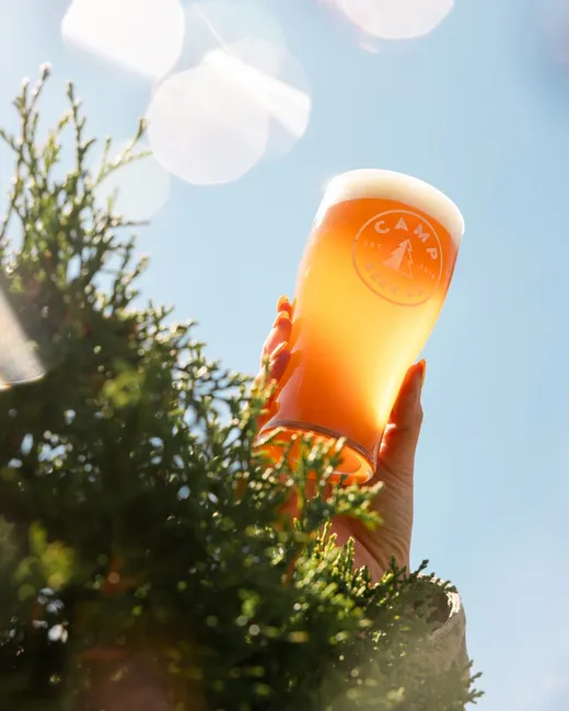hero-cheers-glass.png